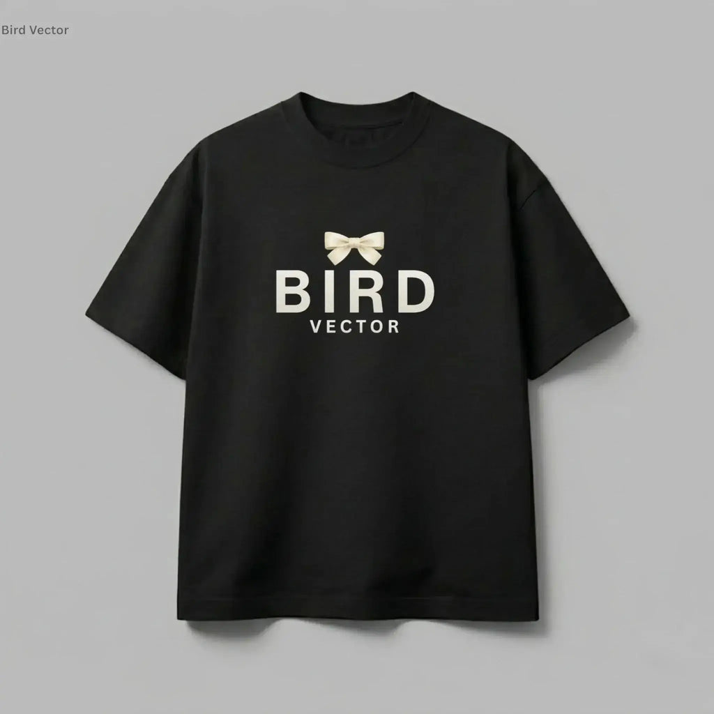 Cream ribbon bow graphic on a black t-shirt. 180gsm organic ringspun cotton featuring BIRD VECTOR minimalist text branding.
