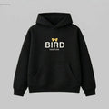 Yellow ribbon bow graphic on a black heavyweight hoodie.320gsm hoodie featuring BIRD VECTOR minimalist text